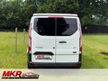 Daumennagel 18 - Ford Transit Custom Camper WoMo Caravan Aufstelldach Klima Küche