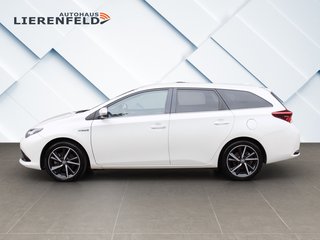 Toyota Auris Touring Sports Hybrid - фото 6