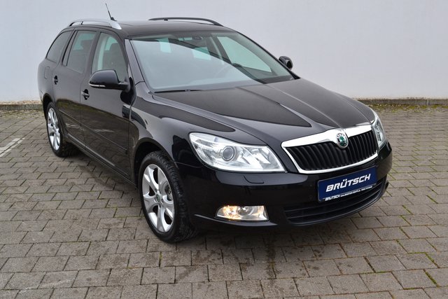 Skoda Octavia Combi 2.0 TDI DSG Elegance NAVI / XENON / SCHIEBEDACH - foto 1