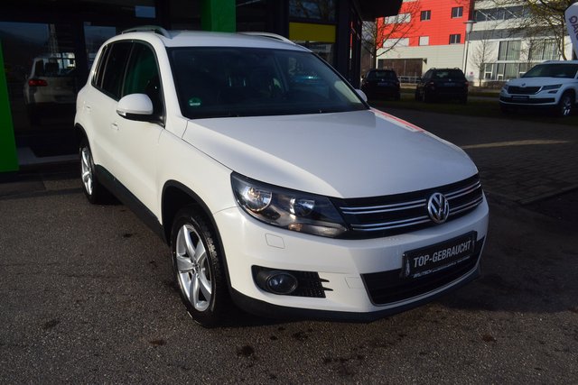 Volkswagen Tiguan 1.4 TSI BMT Sport & Style AHK / NAVI / PDC - foto 1