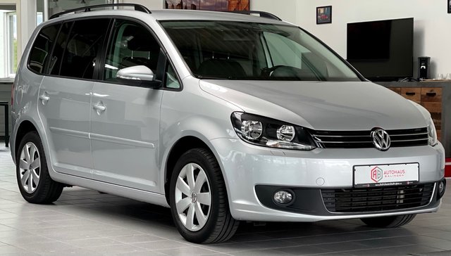 Volkswagen Touran TSI Comfortline 1.HAND|SHZ|NAVI|PDC|TEMPOMAT Gebrauchtwagen Kaufen | EZ 08/2013 | Preis 9.990 €