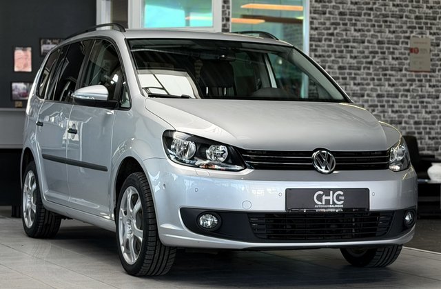 Volkswagen Touran 1.HAND|DSG|SHZ|PDC|SCHECKHEFT! Gebrauchtwagen Kaufen | EZ 04/2014 | Preis 6.990 €