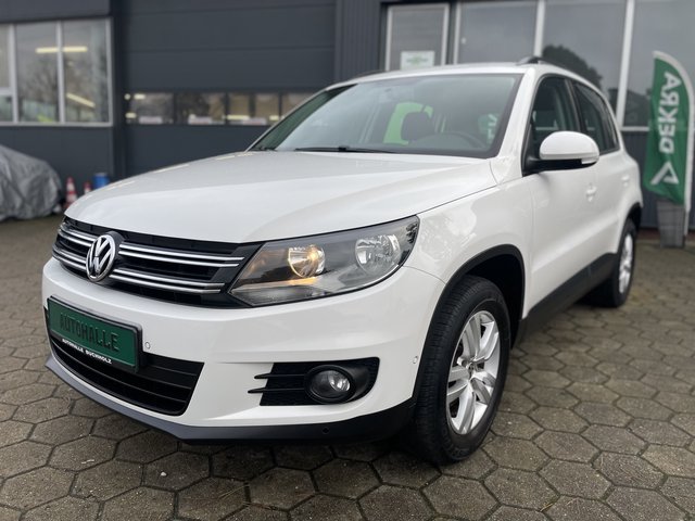Volkswagen Tiguan Trend & Fun BMT~Trend &amp; Fun BlueMotion Technology~NAVI~PDC vorne-hinten~KLIMAAUTOMATIK~ALU~SITZH~6 Gang~TEMPOMATIK~SELBSTPARKENSYSTEM~ Sehr sauberes Fahrzeug~inkl. TÜV NEU nach verkauft.! - bilder 1