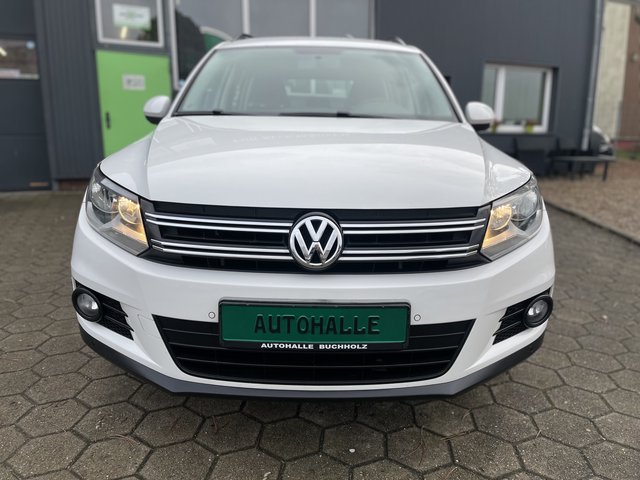 Volkswagen Tiguan Trend & Fun BMT~Trend &amp; Fun BlueMotion Technology~NAVI~PDC vorne-hinten~KLIMAAUTOMATIK~ALU~SITZH~6 Gang~TEMPOMATIK~SELBSTPARKENSYSTEM~ Sehr sauberes Fahrzeug~inkl. TÜV NEU nach verkauft.! - bilder 2