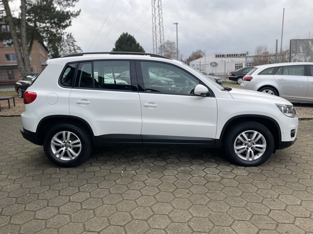 Volkswagen Tiguan Trend & Fun BMT~Trend &amp; Fun BlueMotion Technology~NAVI~PDC vorne-hinten~KLIMAAUTOMATIK~ALU~SITZH~6 Gang~TEMPOMATIK~SELBSTPARKENSYSTEM~ Sehr sauberes Fahrzeug~inkl. TÜV NEU nach verkauft.! - bilder 8