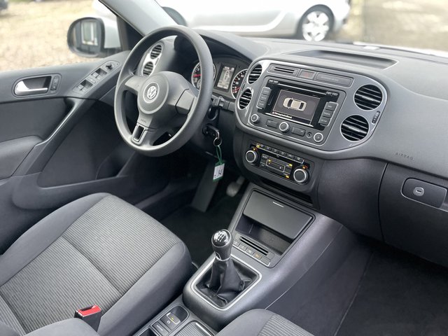 Volkswagen Tiguan Trend & Fun BMT~Trend &amp; Fun BlueMotion Technology~NAVI~PDC vorne-hinten~KLIMAAUTOMATIK~ALU~SITZH~6 Gang~TEMPOMATIK~SELBSTPARKENSYSTEM~ Sehr sauberes Fahrzeug~inkl. TÜV NEU nach verkauft.! - bilder 13