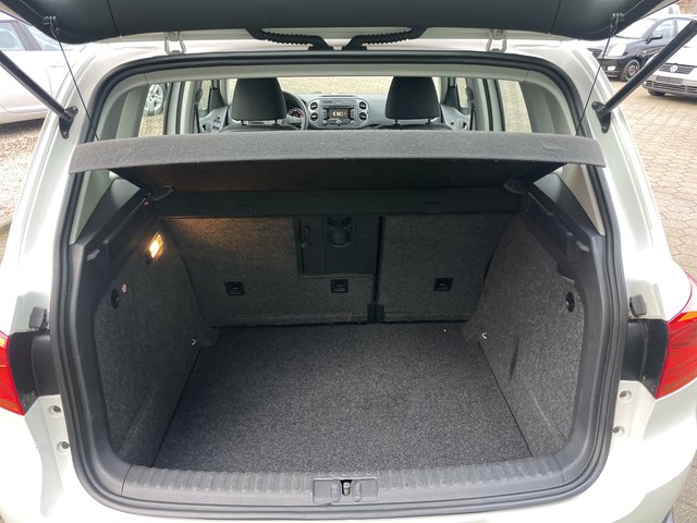 Volkswagen Tiguan Trend & Fun BMT~Trend &amp; Fun BlueMotion Technology~NAVI~PDC vorne-hinten~KLIMAAUTOMATIK~ALU~SITZH~6 Gang~TEMPOMATIK~SELBSTPARKENSYSTEM~ Sehr sauberes Fahrzeug~inkl. TÜV NEU nach verkauft.! - bilder 5