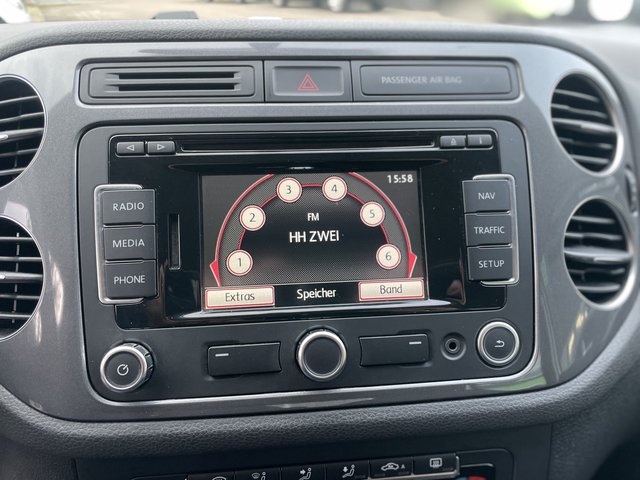 Volkswagen Tiguan Trend & Fun BMT~Trend &amp; Fun BlueMotion Technology~NAVI~PDC vorne-hinten~KLIMAAUTOMATIK~ALU~SITZH~6 Gang~TEMPOMATIK~SELBSTPARKENSYSTEM~ Sehr sauberes Fahrzeug~inkl. TÜV NEU nach verkauft.! - bilder 26