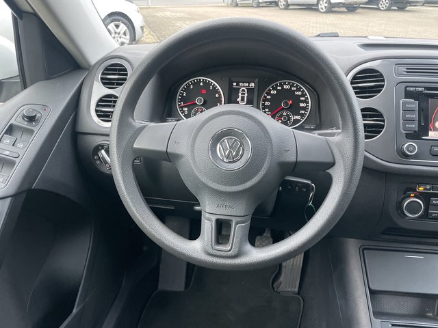 Volkswagen Tiguan Trend & Fun BMT~Trend &amp; Fun BlueMotion Technology~NAVI~PDC vorne-hinten~KLIMAAUTOMATIK~ALU~SITZH~6 Gang~TEMPOMATIK~SELBSTPARKENSYSTEM~ Sehr sauberes Fahrzeug~inkl. TÜV NEU nach verkauft.! - bilder 11