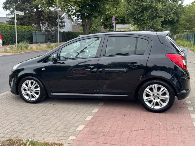 Opel Corsa D Satellite 1.4*OPC-LINE*Klima*Shz*TÜV NEU - bilder 7
