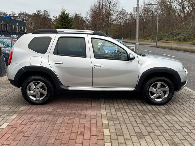 Dacia Duster I Prestige 4x4*Klima*Navi*8-Fachbereift* - bilder 4