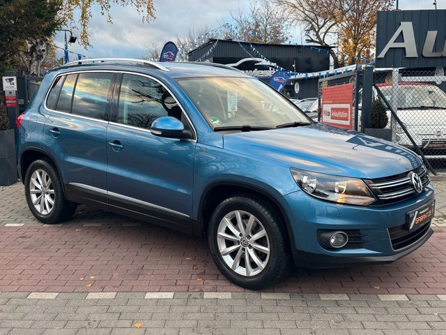 Volkswagen Tiguan Lounge 1.4 TSI Aut*Nav*1.Hd*AHK*TÜV NEU* - foto 1