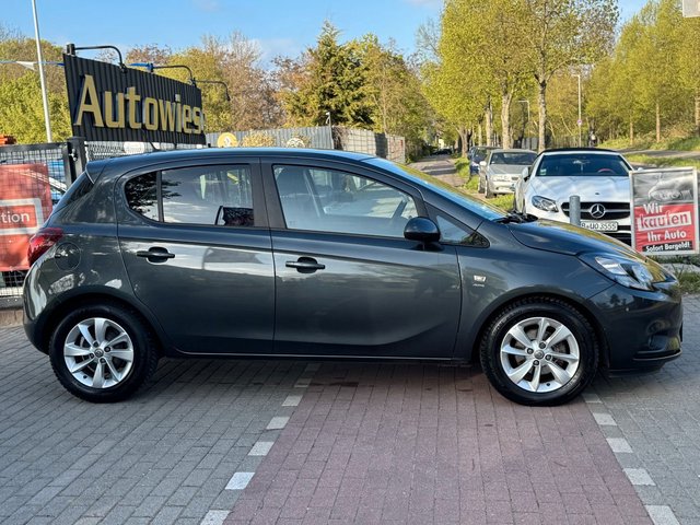 Opel Corsa E 1.4 Active*Aut*Nav*2.Hd*PDC*Szhz*TÜV NEU - bilder 4