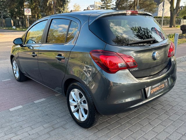 Opel Corsa E 1.4 Active*Aut*Nav*2.Hd*PDC*Szhz*TÜV NEU - bilder 7