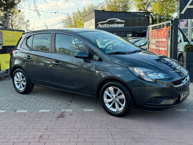 Opel Corsa E 1.4 Active*Aut*Nav*2.Hd*PDC*Szhz*TÜV NEU - bilder 1