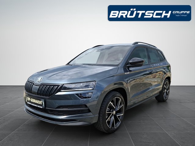 Skoda Karoq 2.0 TSI Sportline 4x4 DSG / PANORAMA / ACC / AHK / NAVI - bilder 1