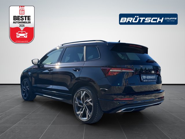 Skoda Karoq 2.0 TSI Sportline 4x4 DSG / AHK / NAVI / PANORAMA / SITZHEIZUNG - bilder 2