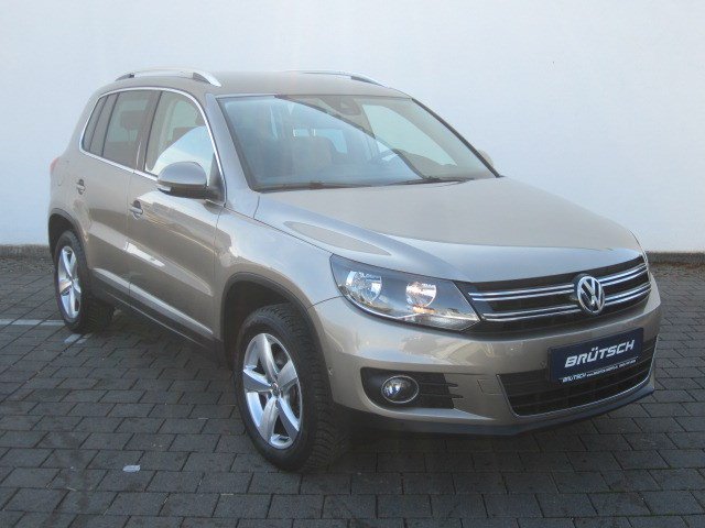 Volkswagen Tiguan 1.4 TSI Sport & Style BMT NAVI / PDC - bilder 1