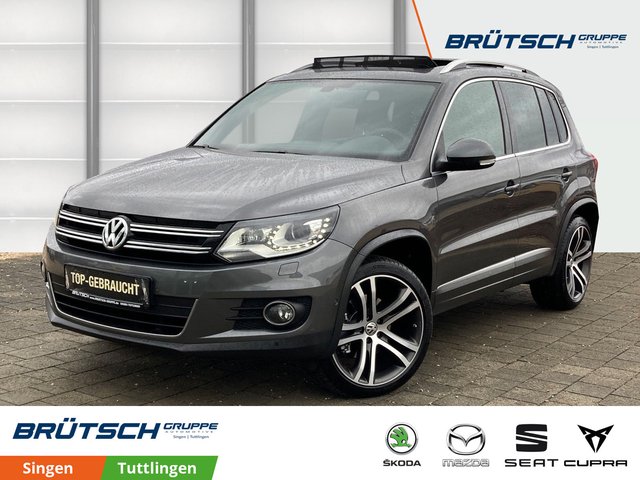 Volkswagen Tiguan 1.4 TSI Sport & Style NAVI / PANORAMA / XENON / AHK / KAMERA - foto 1